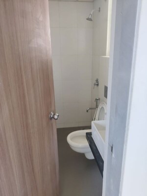 Bathroom in 1.5 BHK Apartment at Godrej Emerald, Ghodbunder Road – for Rent