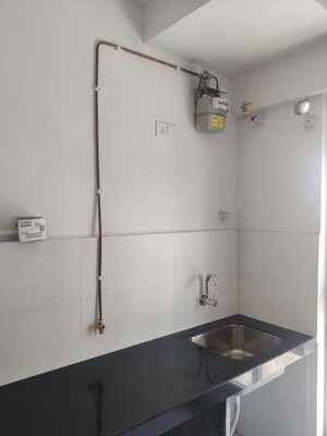 Kitchen in 1.5 BHK Apartment at Godrej Emerald, Ghodbunder Road – for Rent