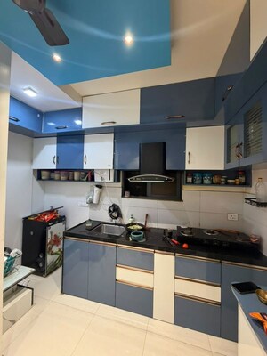 Kitchen in 2 BHK Apartment at Kumar Pebble Park, Hadapsar – for Sale