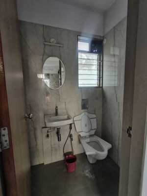 Bathroom in 1 BHK Apartment at Rishabraj Pride, Dahisar West – for Rent