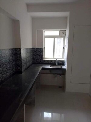 Kitchen in 1.5 BHK Apartment at Lodha Amara, Kolshet Road – for Rent