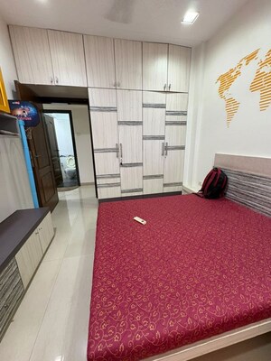 Bedroom in 2 BHK Apartment at K Raheja Heights, Malad East – for Rent