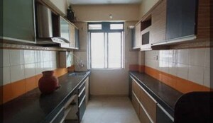 Kitchen in 3 BHK Apartment at Dosti Imperia Phase I, Ghodbunder Road – for Rent