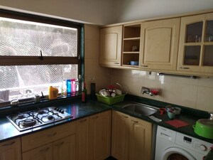 Kitchen in 2 BHK Apartment at Satguru Shristi Apartment, Bandra West – for Sale