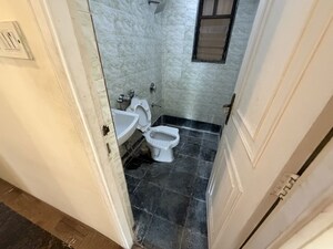 Bathroom in 2 BHK Apartment at Vasant Vihar – for Rent