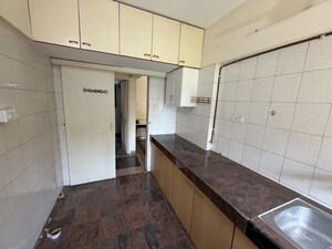 Kitchen in 2 BHK Apartment at Vasant Vihar – for Rent