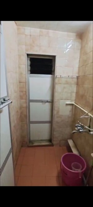 Bathroom in 2 BHK Apartment at Andheri CHS, Andheri West – for Rent