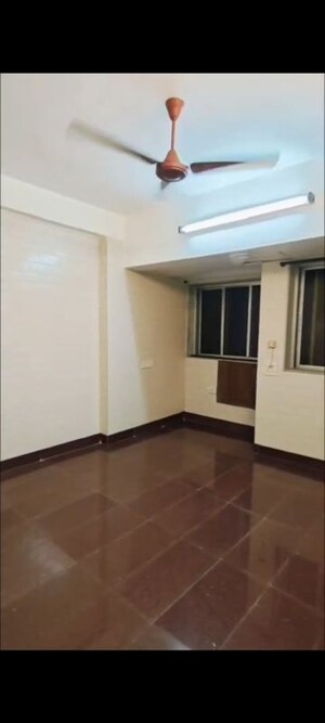Room in 2 BHK Apartment at Andheri CHS, Andheri West – for Rent