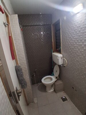 Bathroom in 2 BHK Apartment at Tilak Bhavana CHS, Tilak Nagar – for Rent