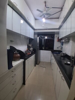Kitchen in 2 BHK Apartment at Tilak Bhavana CHS, Tilak Nagar – for Rent