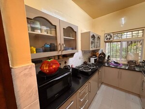Kitchen in 3 BHK Apartment at RJ Garden, Indiranagar – for Rent
