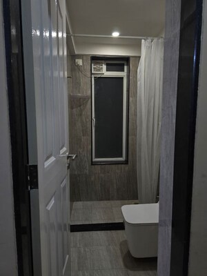 Building Lobby in 2 BHK Apartment at Aspen Park, Goregaon East – for Rent