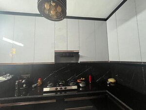 Kitchen in 2 BHK Apartment at Arun Vihar Sector 37, Sector 37 – for Sale
