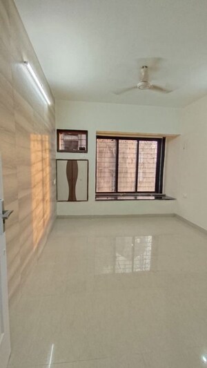 Room in 2 BHK Apartment at Swapnalok Apartments Malad East, Malad East – for Sale