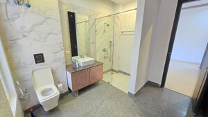 Bathroom in 4 BHK Builder Floor at Sushant Lok I – for Rent