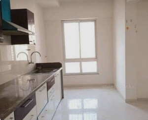 Kitchen in 1.5 BHK Apartment at Puranik Rumah Bali Phase III, Ghodbunder Road – for Rent