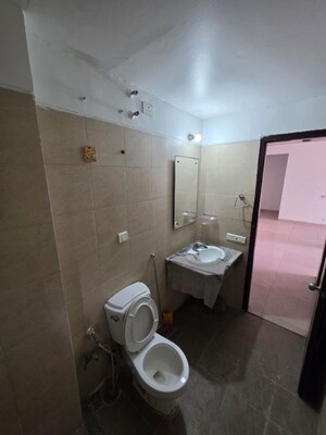 Bathroom in 3 BHK Apartment at Adore Happy Homes, Sector 86 – for Sale