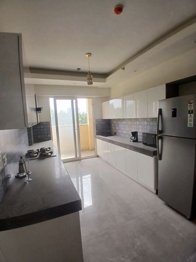 Kitchen, tulip-yellow 3 Bedroom 1704 Sq.Ft. Apartment In Sector 69 Gurgaon 10742893