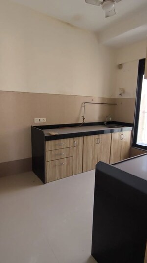 Kitchen in 2 BHK Apartment at Rustomjee Elanza, Malad West – for Rent