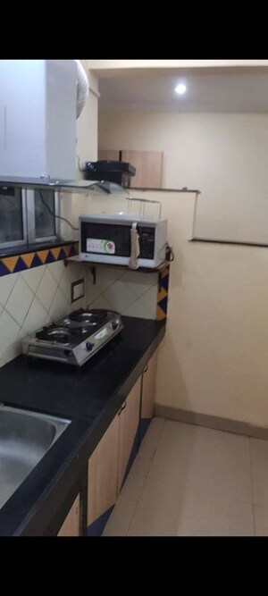 Kitchen in 2 BHK Apartment at Naiknavare Trinity Court, Koregaon Park – for Rent