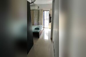 Building Lobby in 2 BHK Apartment at Cosmopolis Tower, Andheri West – for Rent