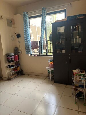 Living Room in 2 BHK Apartment at Bhaktiyog CHS, Kothrud – for Sale