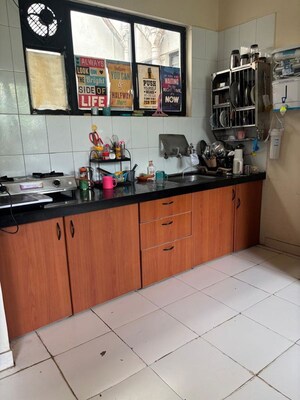 Kitchen in 2 BHK Apartment at Bhaktiyog CHS, Kothrud – for Sale