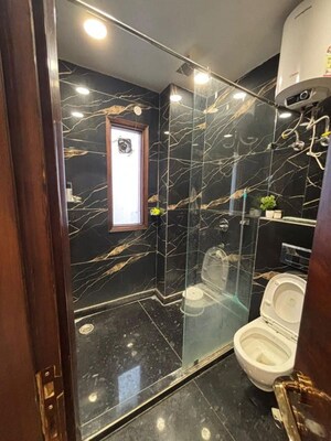 Bathroom in 4 BHK Apartment at Freedom Fighters Enclave – for Rent