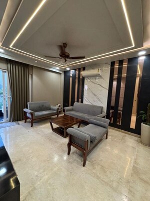 Living Room in 4 BHK Apartment at Freedom Fighters Enclave – for Rent