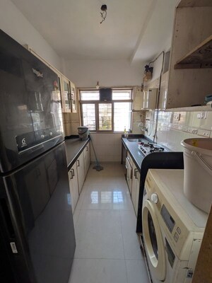 Kitchen in 2 BHK Apartment at Ashok Enclave Malad West, Malad West – for Sale