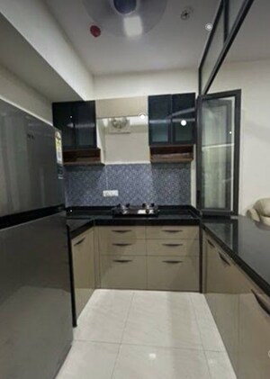 Kitchen in 1 BHK Apartment at Lodha Crown Quality Homes, Majiwada – for Sale