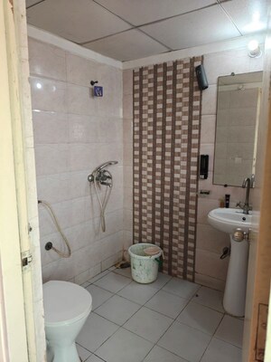 Bathroom in 2 BHK Apartment at Gaur City 2 - 12th Avenue, Sector 16c Greater Noida – for Rent