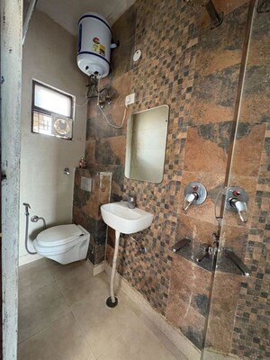 Bathroom in 3 BHK Builder Floor at Smart World Orchard, Sector 61 – for Rent