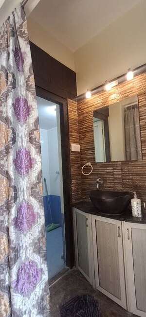Bedroom in 2 BHK Apartment at Sheth Vasant Sagar Complex, Kandivali East – for Rent