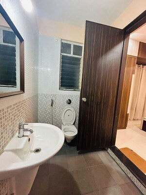 Bathroom in 3 BHK Apartment at Sukhwani Scarlet, Wagholi – for Rent
