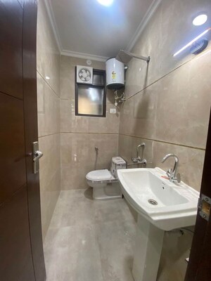 Bathroom in 3 BHK Apartment at Chattarpur – for Rent