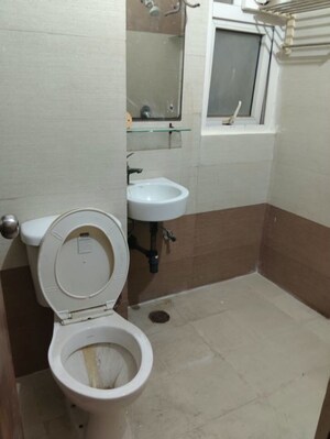 Bathroom in 2 BHK Apartment at Aims Golf City, Sector 75 – for Rent