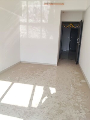 Living Room in 2 BHK Apartment at Naman Habitat, Andheri West – for Rent