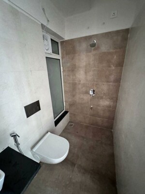 Bathroom in 1 BHK Apartment at Omkar Signet, Malad East – for Rent