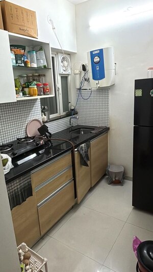 Kitchen in 2 BHK Apartment at Omkar Signet, Malad East – for Rent