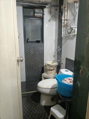 Bathroom in 2 BHK Apartment at Karve Nagar – for Rent