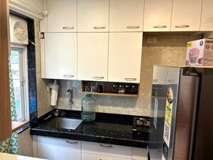 Kitchen in 1 BHK Apartment at Panom Park, Vile Parle East – for Sale