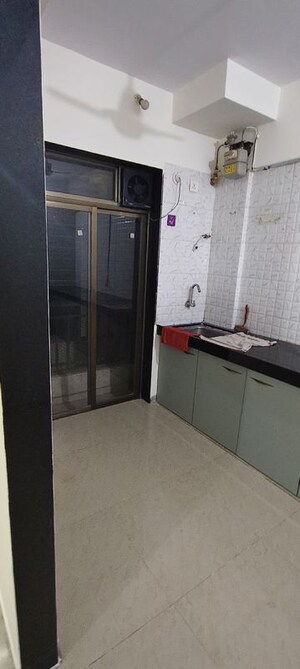 Kitchen in 2 BHK Apartment at K M Horizon Palms 2, Owale – for Rent