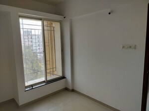 Room in 2 BHK Apartment at Dhanori – for Rent