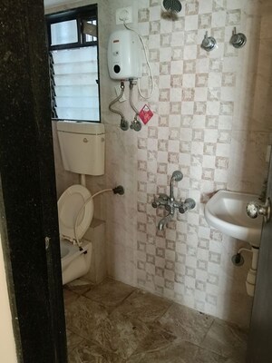 Bathroom in 1 BHK Apartment at Bhoomi Acropolis, Virar West – for Rent