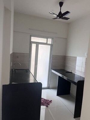 Kitchen in 1 BHK Apartment at Godrej Nirvaan, Themghar – for Rent