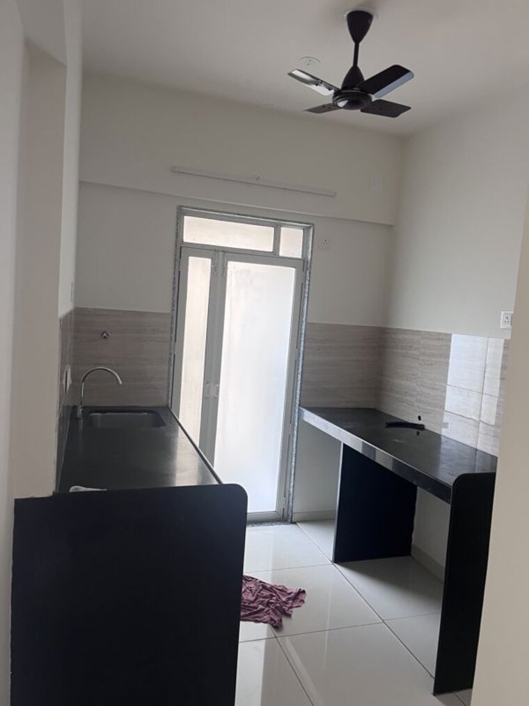 Kitchen, godrej-nirvaan 1 Bedroom 419 Sq.Ft. Apartment In Themghar Thane 10744046