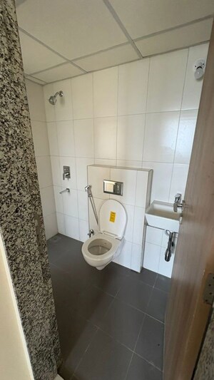 Bathroom in 1 BHK Apartment at Godrej Nirvaan, Themghar – for Rent