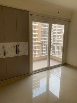 Bedroom in 3 BHK Apartment at Aditya Celebrity Homes, Sector 76 – for Rent