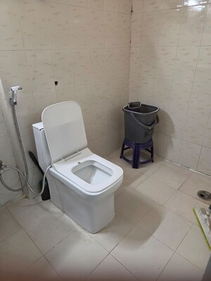 Bathroom in 3 BHK Apartment at Emenox Brave Hearts, Raj Nagar Extension – for Rent